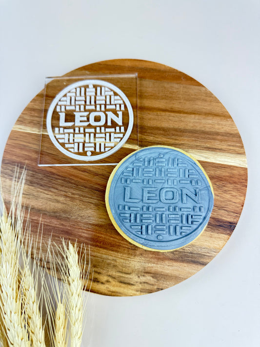 CUSTOM SEWER LID - COOKIE STAMP